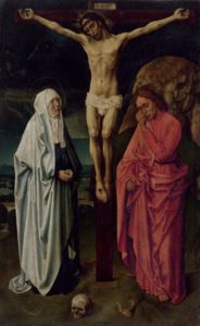 Le Christ est suspendu à la Croix, encadré de part et d'autre par la Vierge et saint Jean.